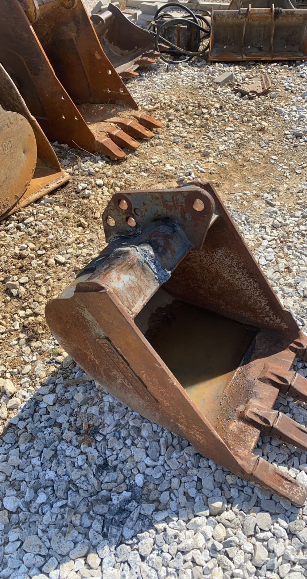 Project Excavator Bucket Modified with a New Quick Coupler Plate in Foristell image