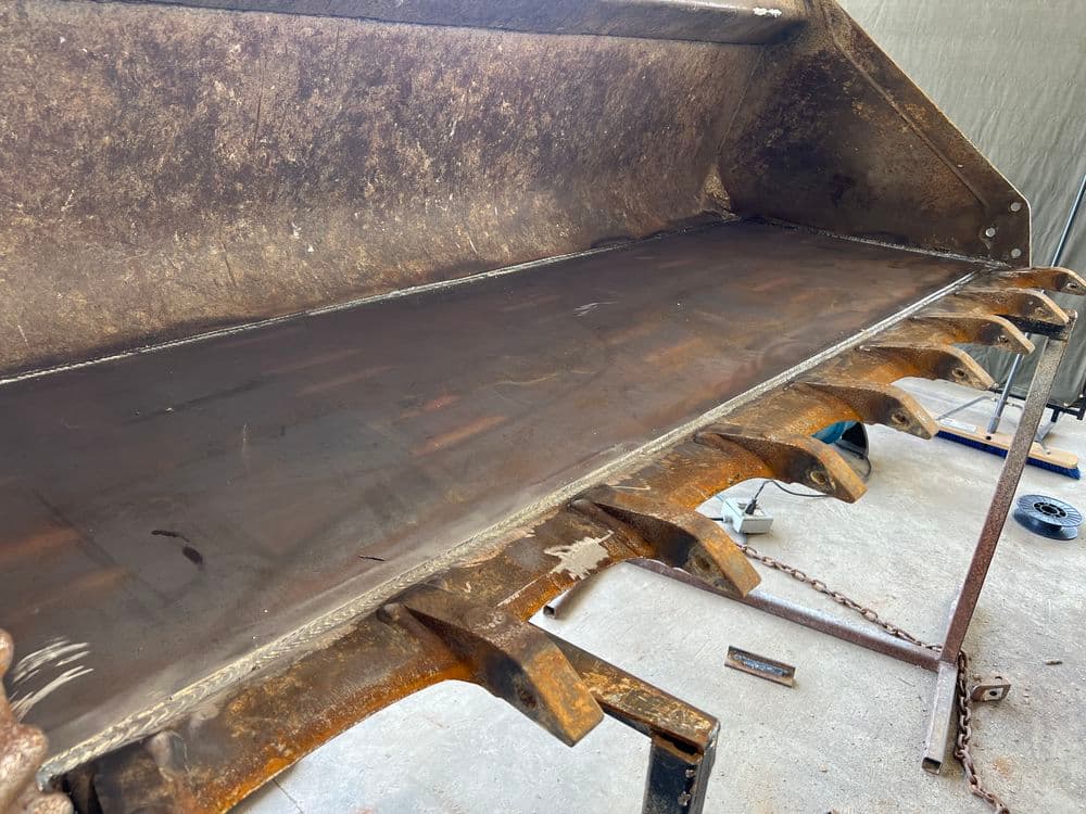 Excavator Bucket Floor Rebuild with Wear Bar Protection in Troy MO image